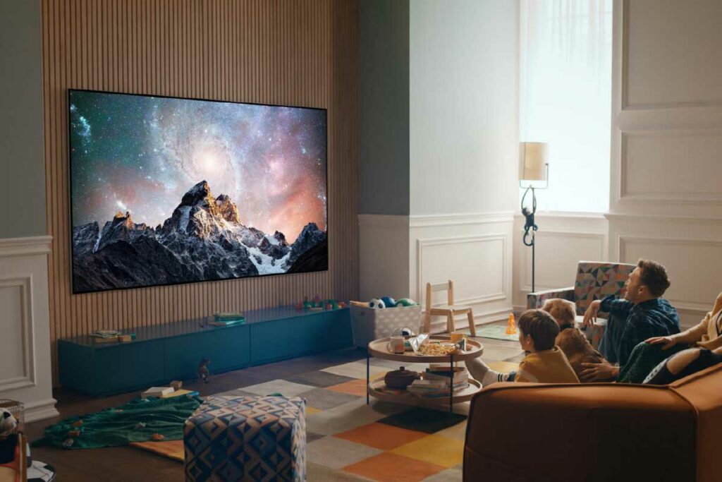 LG OLED evo TV mounted on a living room wall